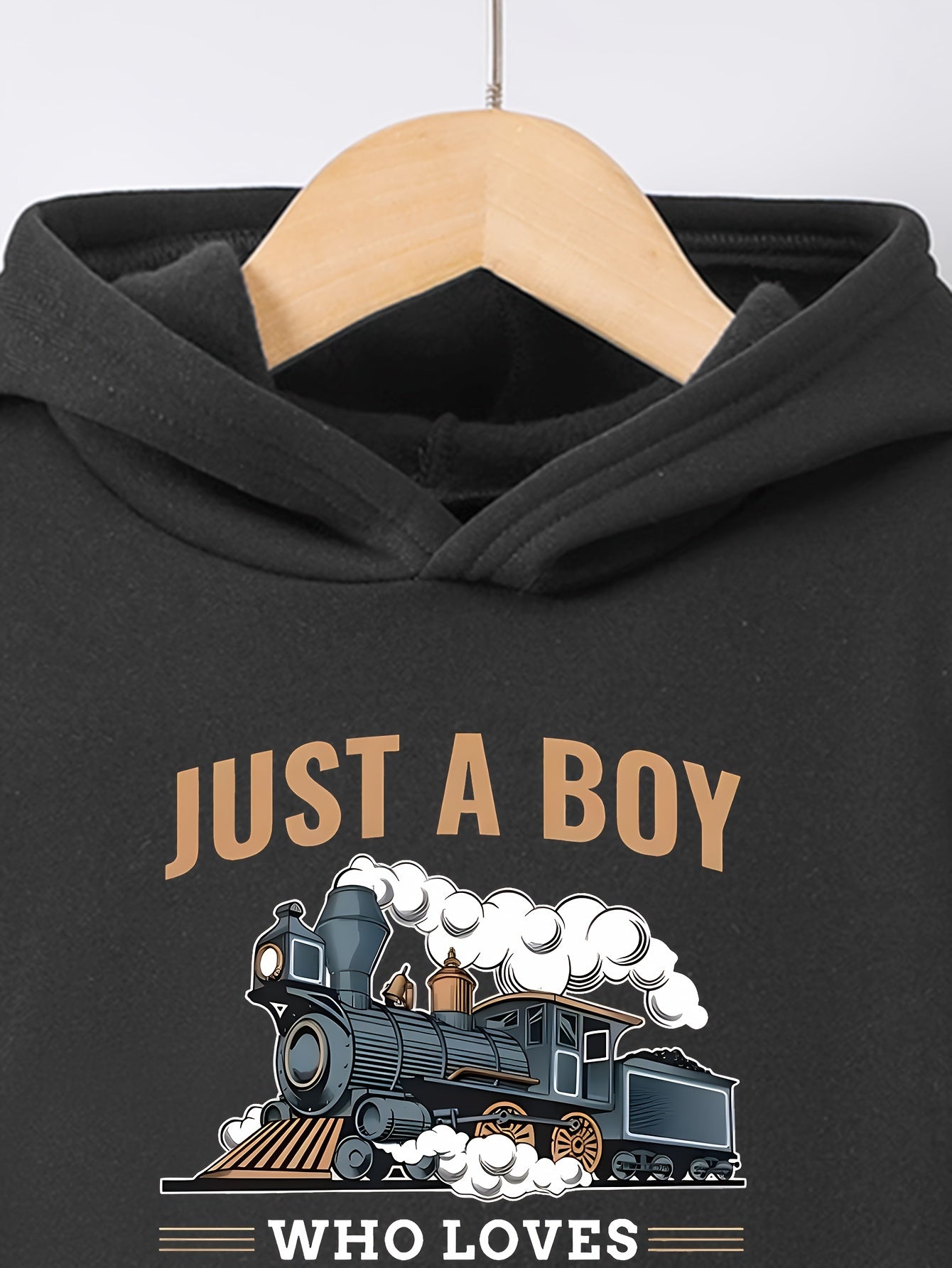 A Boy's Hooded Sweatshirt And Sports Pants With Train Pattern Print